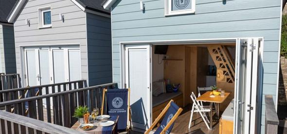 open beach lodge with french doors that allow the air to go through