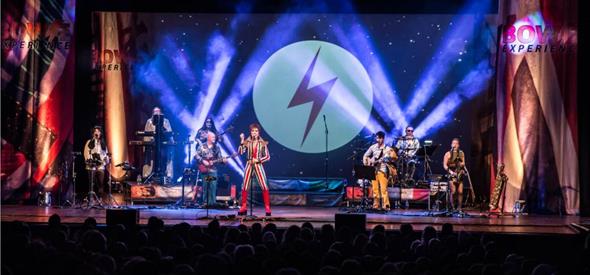 photo of the stage during the Bowie experience with David Bowie's famous lightening symbol.