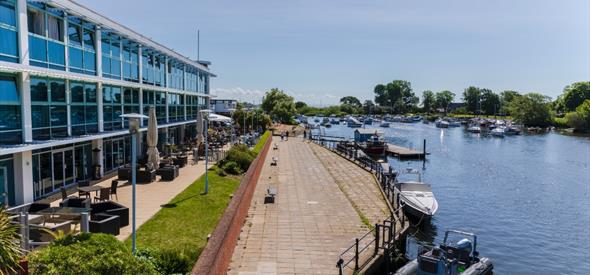 Exterior of the hotel by the river side.