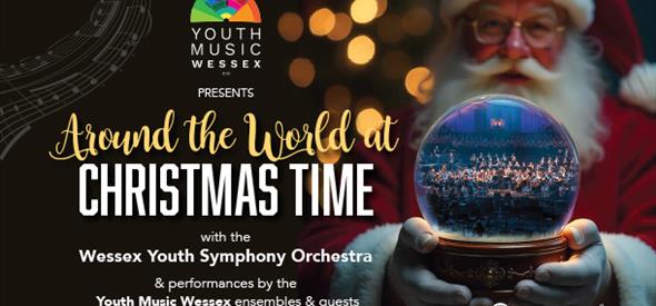 Santa holding a snow globe ,which contains the Wessex Youth Symphony Orchestra