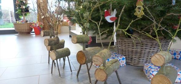 Reindeer Making, photo of handmade log reindeers