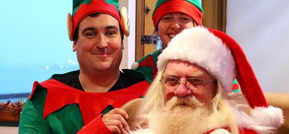Father Christmas and his elves