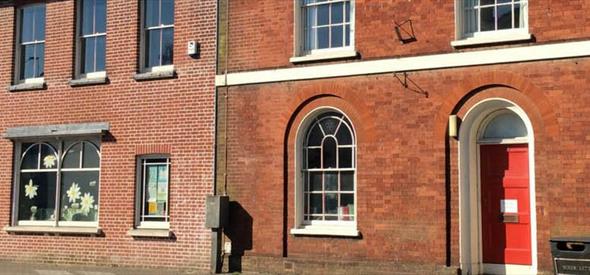 red brick exterior of Christchurch library.