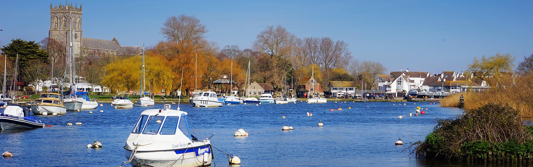 Shot from the bank overlooking the boats moored in Christchurch harbour
