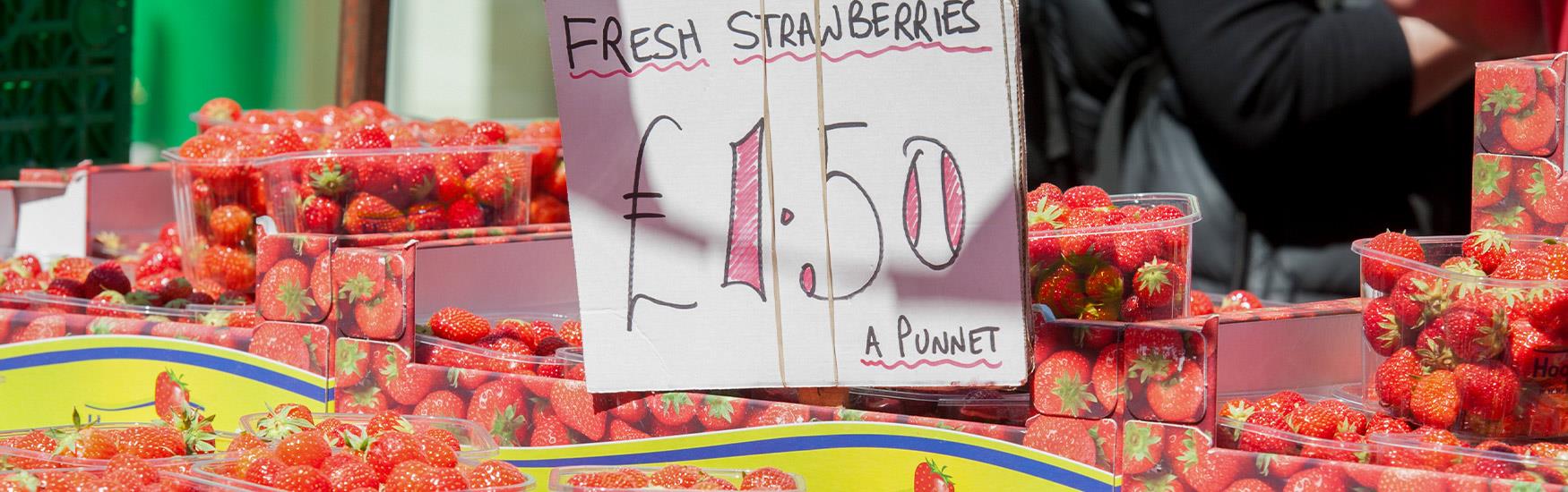 A beautiful selection of red strawberries presented at a market stall in Christchurch