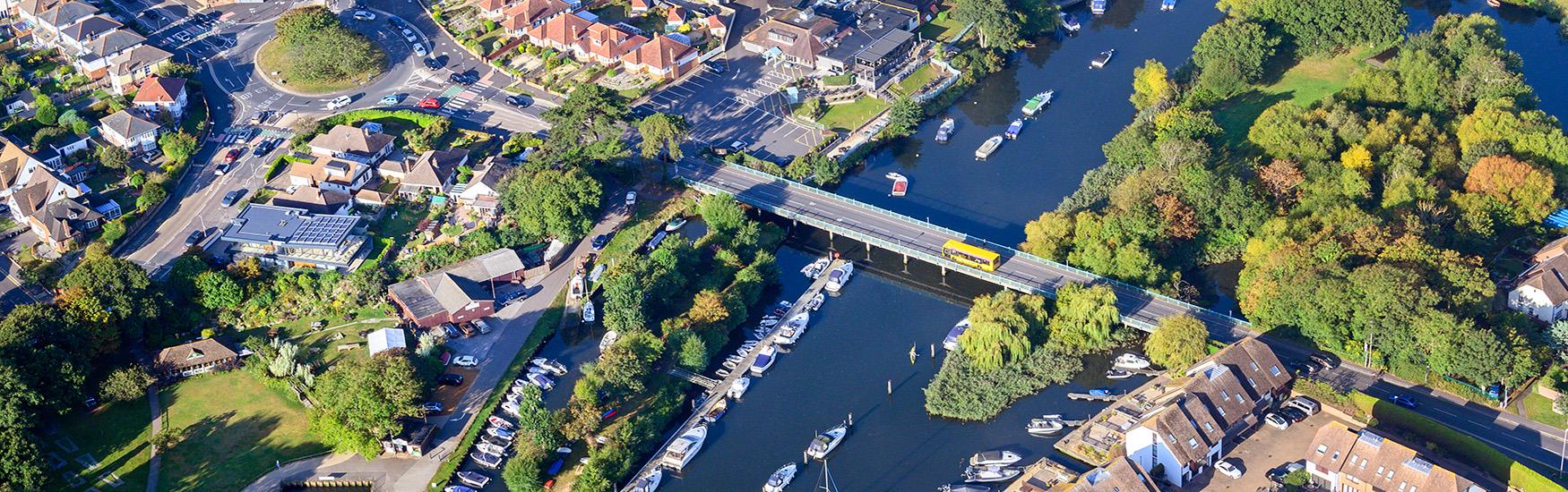 Aerial shot overlooking Tuckton bridge and the roads leading into Christchurch
