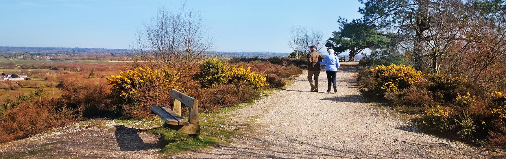 An old couple enjoying a lovely walk surrounded by nature in the Christchurch countryside