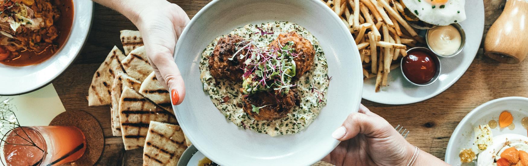 Generic overhead shot of plates with delicious food on them