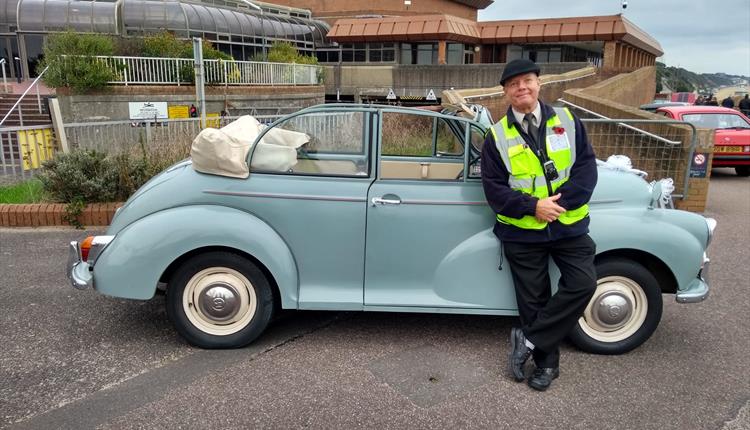 Organiser, Ashley, with his light blue car, Doris.