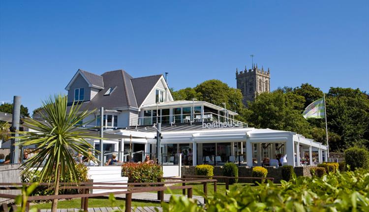 The Boathouse from outside with the Priory in the background
