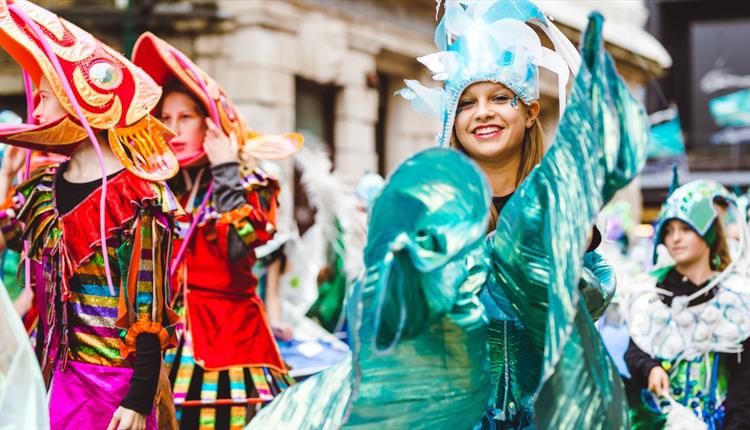 Woman smiling during the Bournemouth Pride Parade