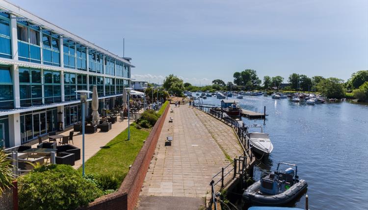 Exterior of the hotel by the river side.