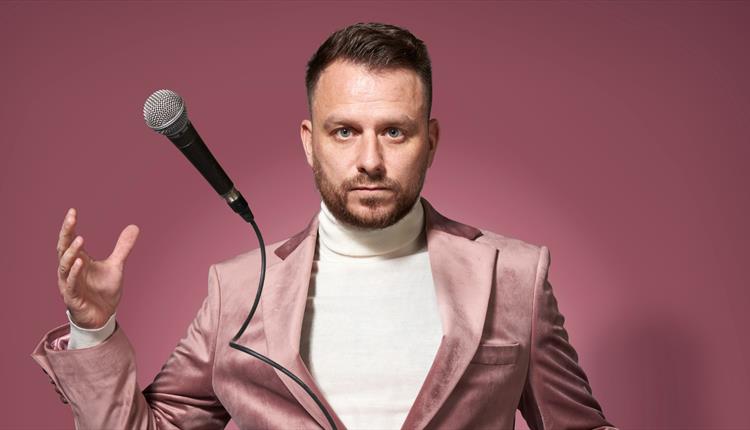 Daniel O'Reilly in a pink suit