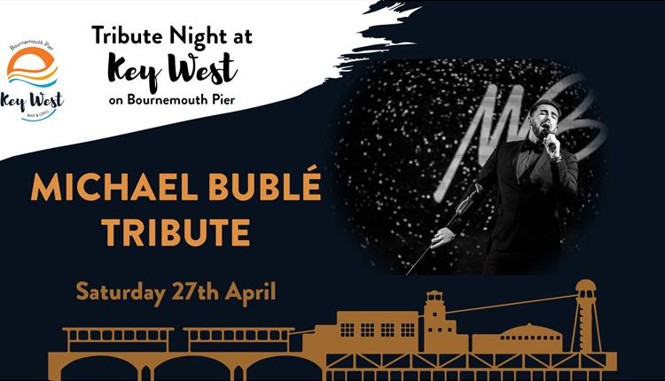 Michael Bublé in black and white singing into a microphone