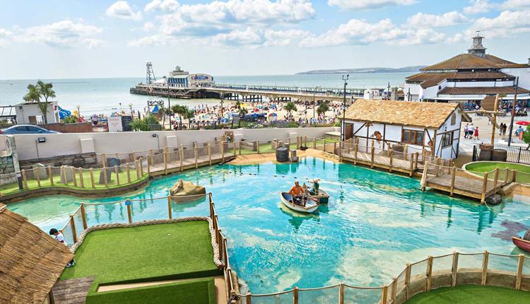 Overhead shot of the stunning smugglers crazy golf with Bournemouth beach and pier in the background