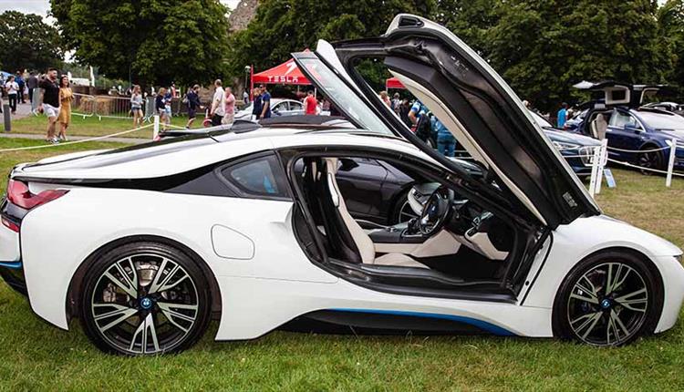 White electric car with door open