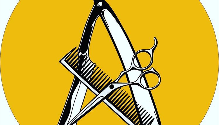 logo - image of scissors and comb