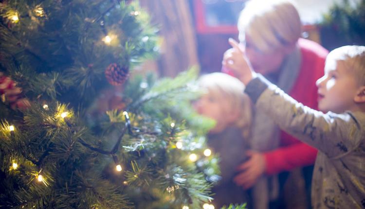 Family around a Christmas tree