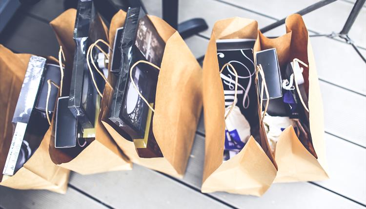 shopping bags full of clothes