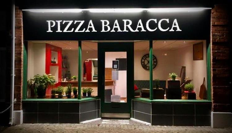 outside of the pizza shop.