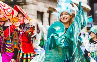 Woman smiling during the Bournemouth Pride Parade
