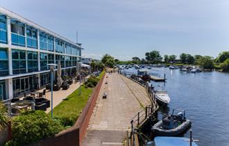 Exterior of the hotel by the river side.