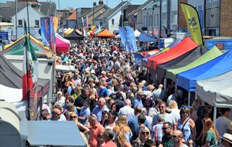 High Street, Highcliffe showing trade stalls and festival visitors
