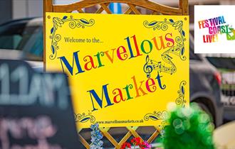The words 'Marvellous Market' on a bright yellow sign