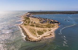 beaches, aerial, birds eye view, shot from above, land, beach, blue sea, blue water, blue sky, boats, beach huts