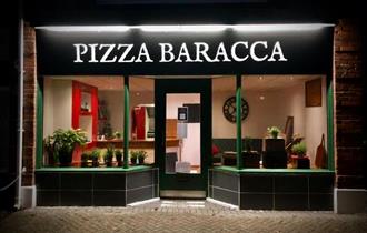 outside of the pizza shop.