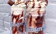 Two exciting looking kinder bueno and reece's pieces flavoured milkshakes