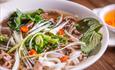 White bowl with noodles