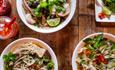 White bowls with noodles