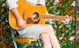 Man with guitar singing