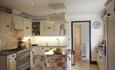 Beautifully decorated cream kitchen in a Bournecoast property