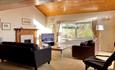 Warm, modern and cosy interior of chalet with wooden details