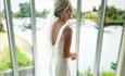 Woman in wedding attire.