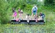 Children pond dipping with nets