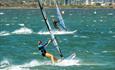 Two Windsurfers out in the Harbour.