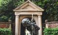 Water feature statue in the Roman gardens.