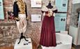 Exhibition of 19th century ladies and gentleman's costumes.