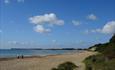 A couple of people out on the beach looking west toward Poole and Bournemouth.
