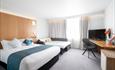 Double bed and guest bed in family room