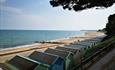 Friars Cliff Beach Huts view west towards Mudeford and Bournemouth.