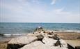 One of the groynes and Friars Cliff.