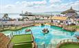 Overhead shot of the stunning smugglers crazy golf with Bournemouth beach and pier in the background
