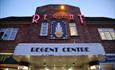 Front of the Regent Centre Building lit up at night time