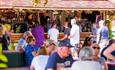 Bar packed with visitors drinking and enjoying the sun in Bournemouth