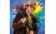 Woody Cook wearing a flower hat