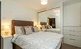 Master room with a large sliding cupboard